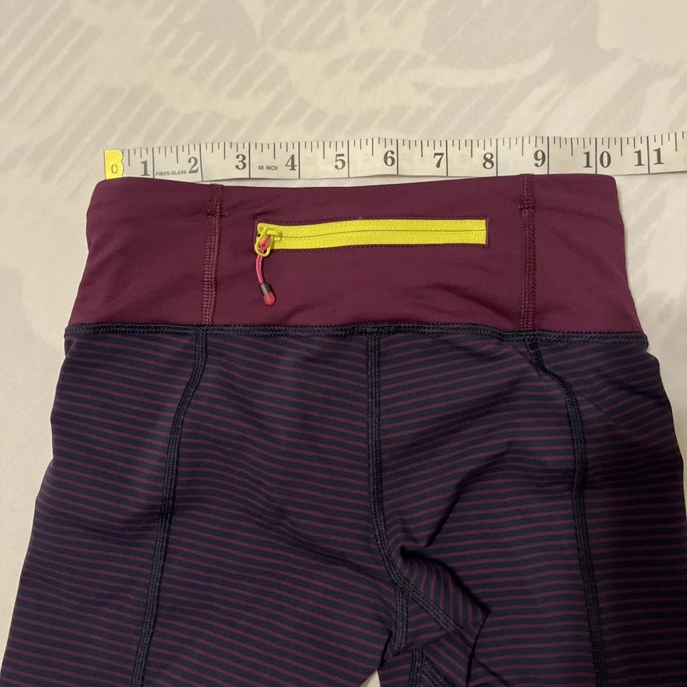 Lululemon Run: For Your Life Crops in a purple and navy hyper-stripe No Size Tag